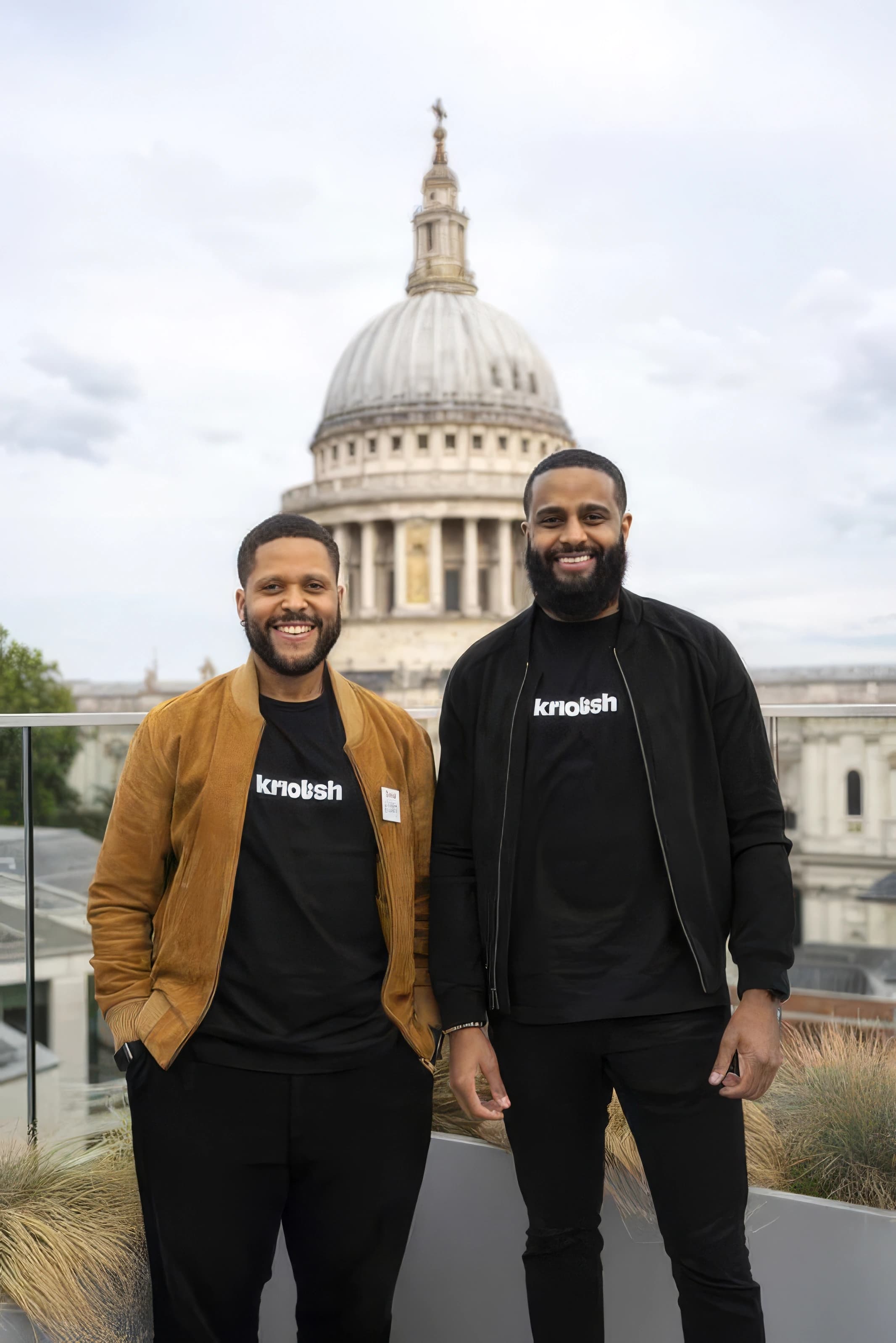 Edmar and Joelson smiling together in London